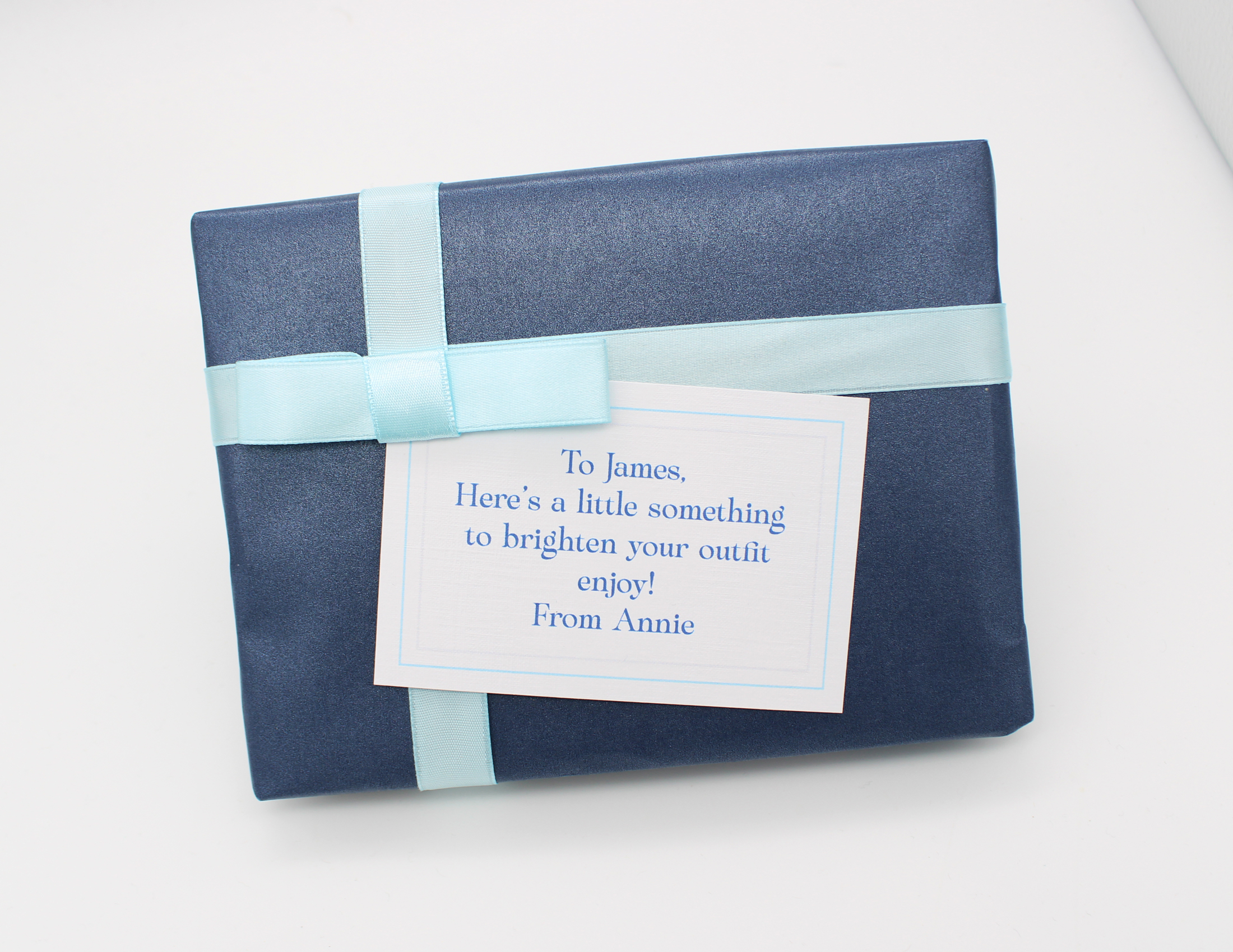Gift Wrapped order in Blue paper with a pale blue ribbon and a gift tag